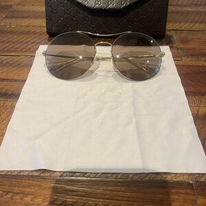 Gucci Round Sunglasses with Silver Frame